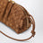 Pochette Concert tressée en cuir ambre