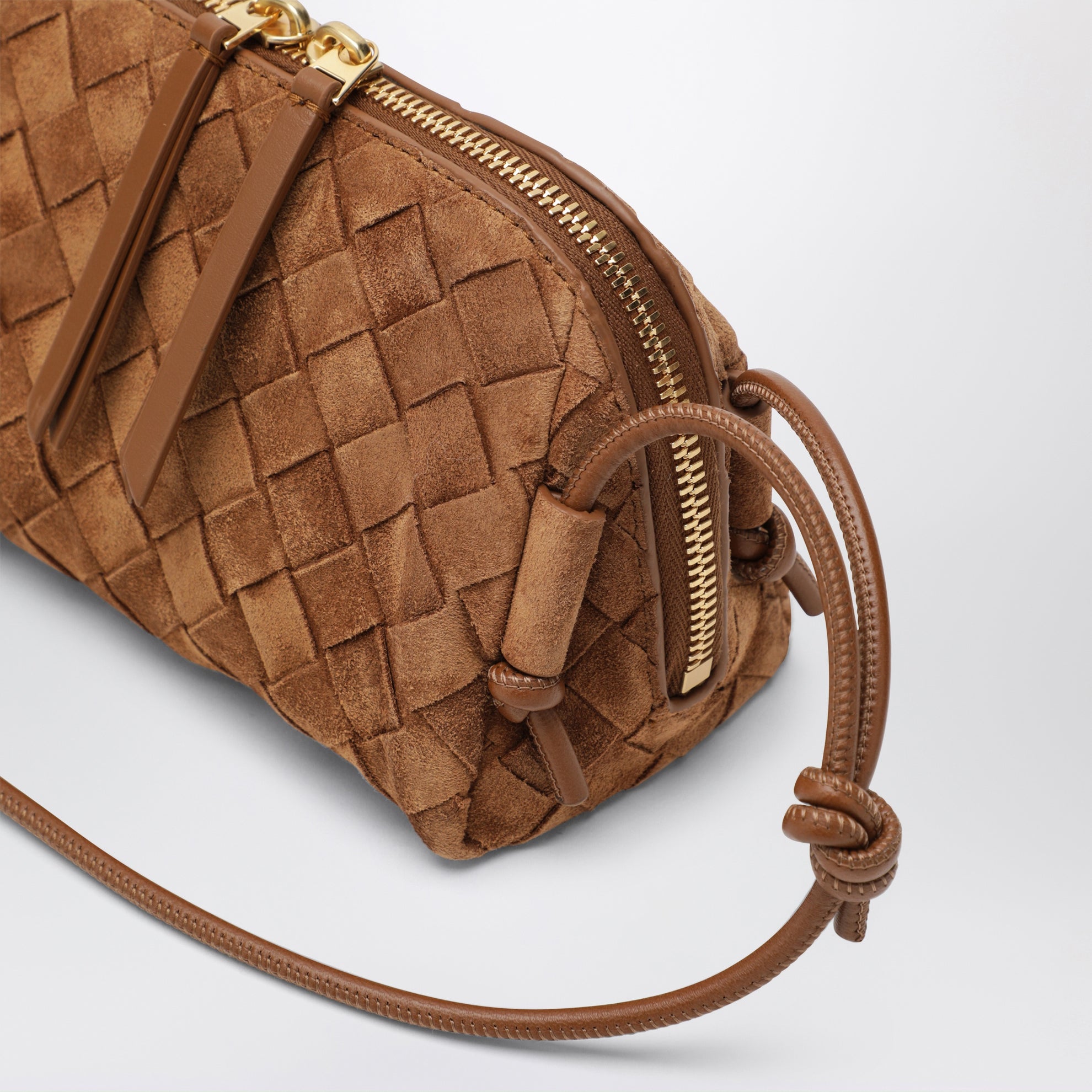 Pochette Concert tressée en cuir ambre