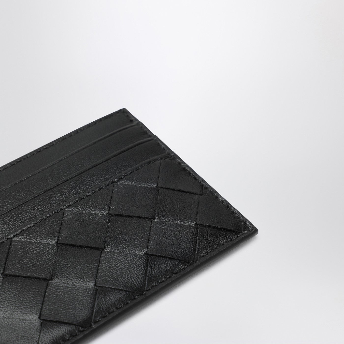 Black card holder in Intrecciato