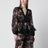 Blusa a peplo in pizzo Carousel nera