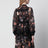 Blusa a peplo in pizzo Carousel nera