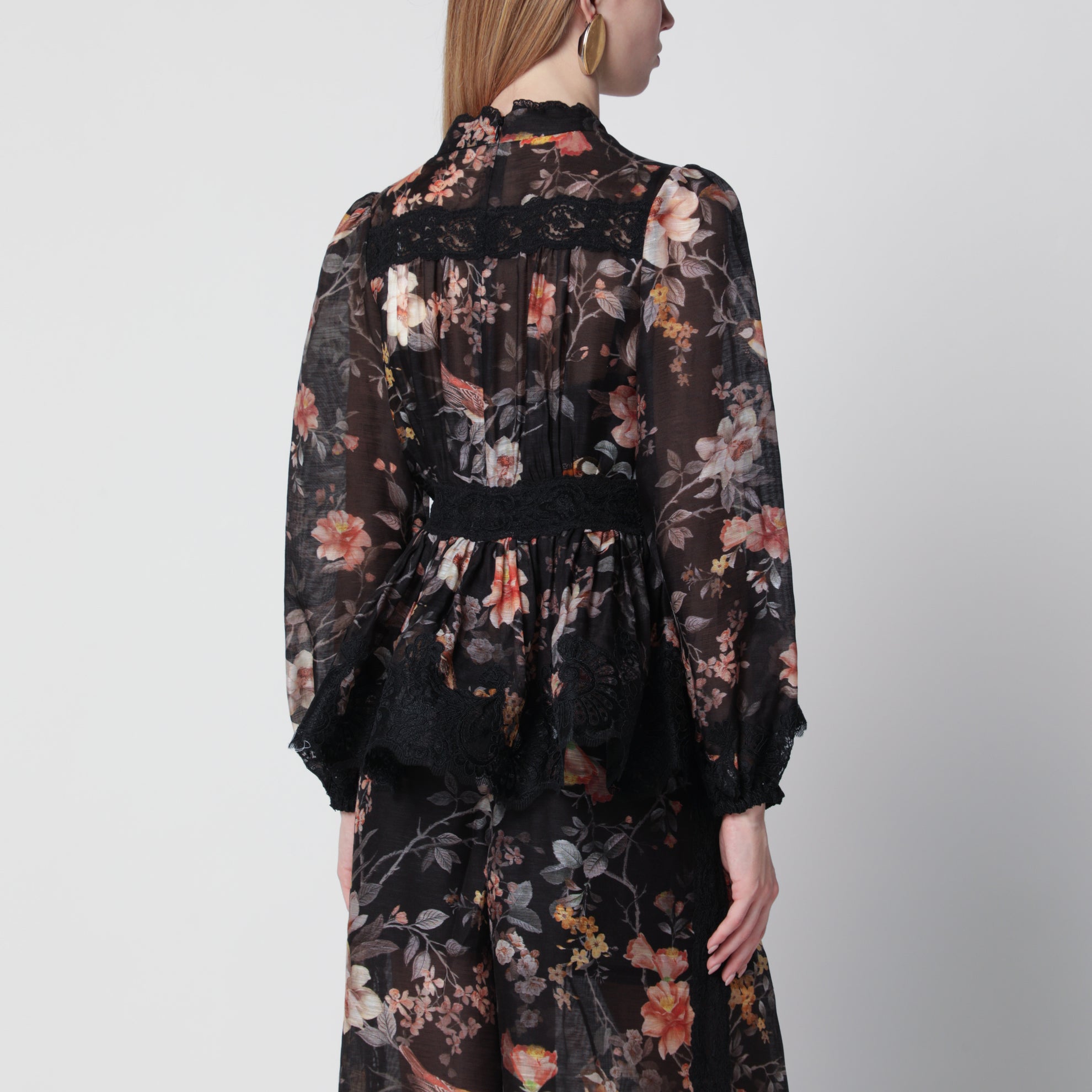 Blusa a peplo in pizzo Carousel nera