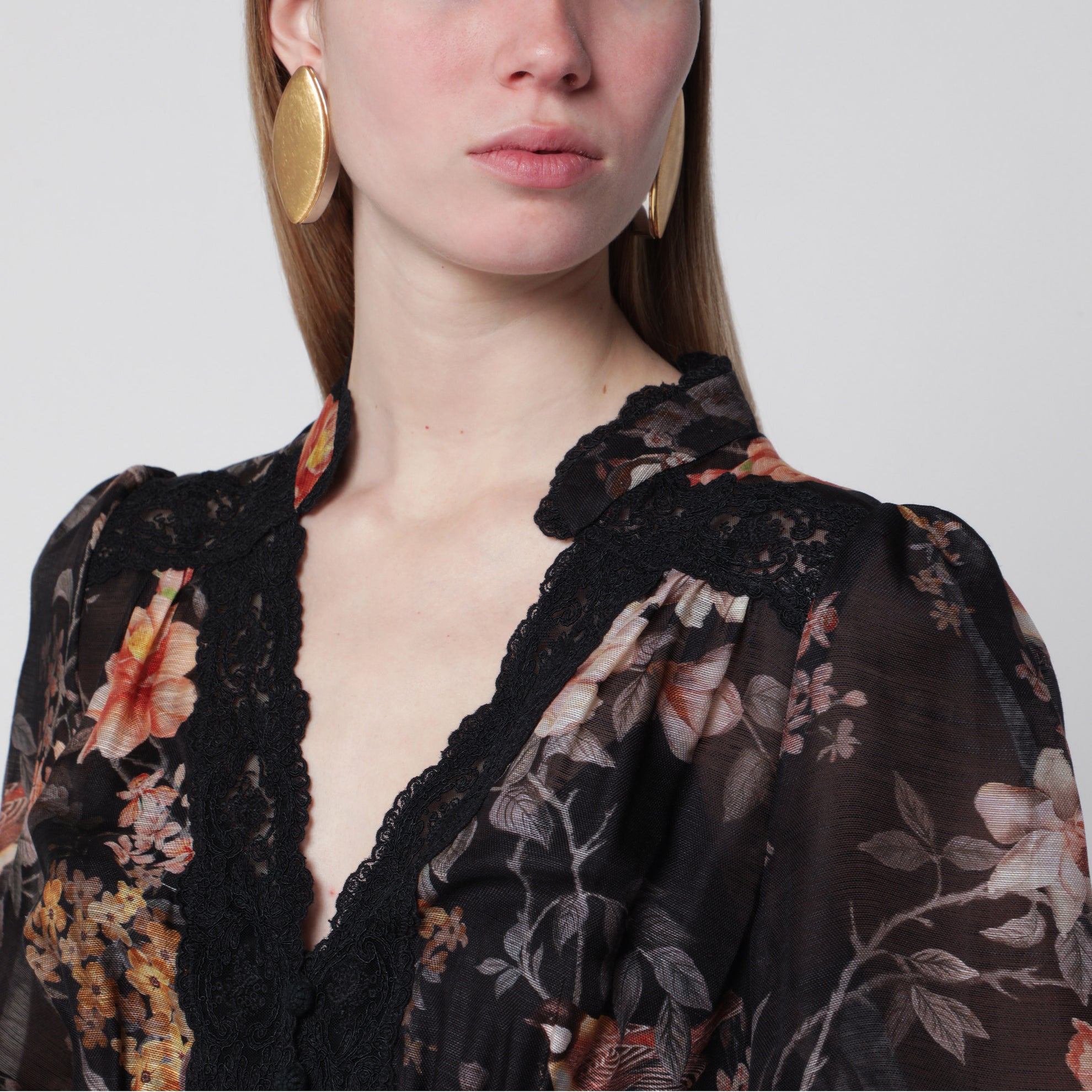 Blusa a peplo in pizzo Carousel nera