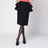 Black skirt with ruffles on the sides