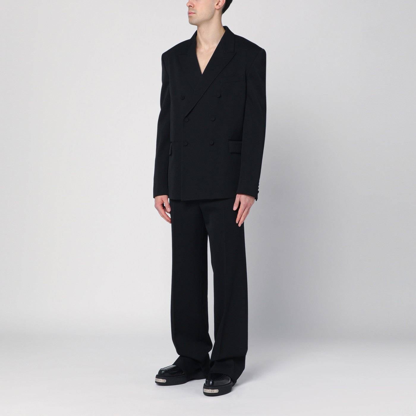 Black double-breasted wool suit