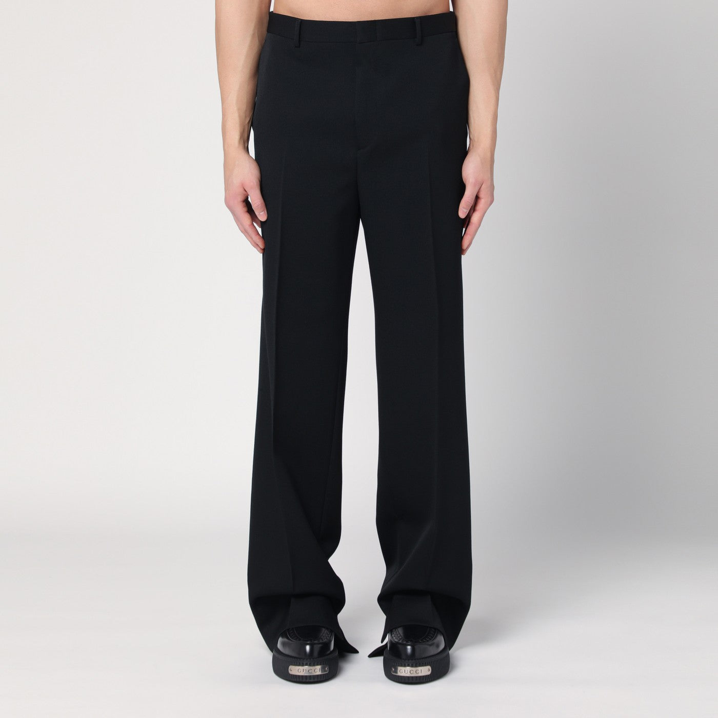 Black double-breasted wool suit
