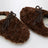 Mules in shearling curly marrone scuro
