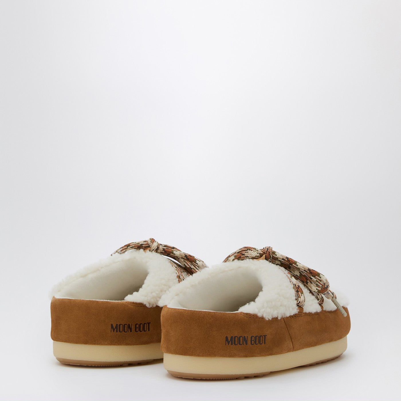 Mules in shearling bianco e suede