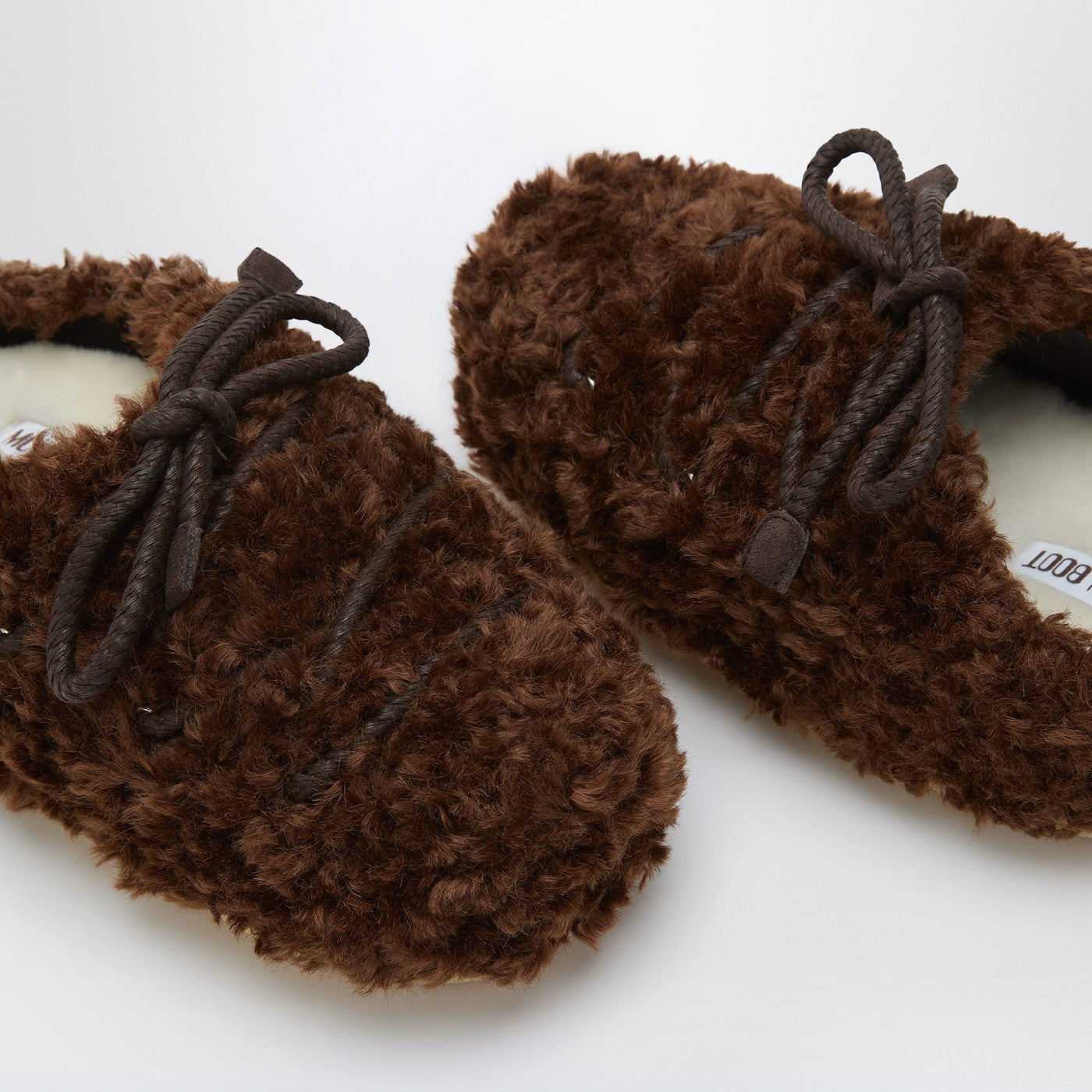 Mules in shearling bianco e suede
