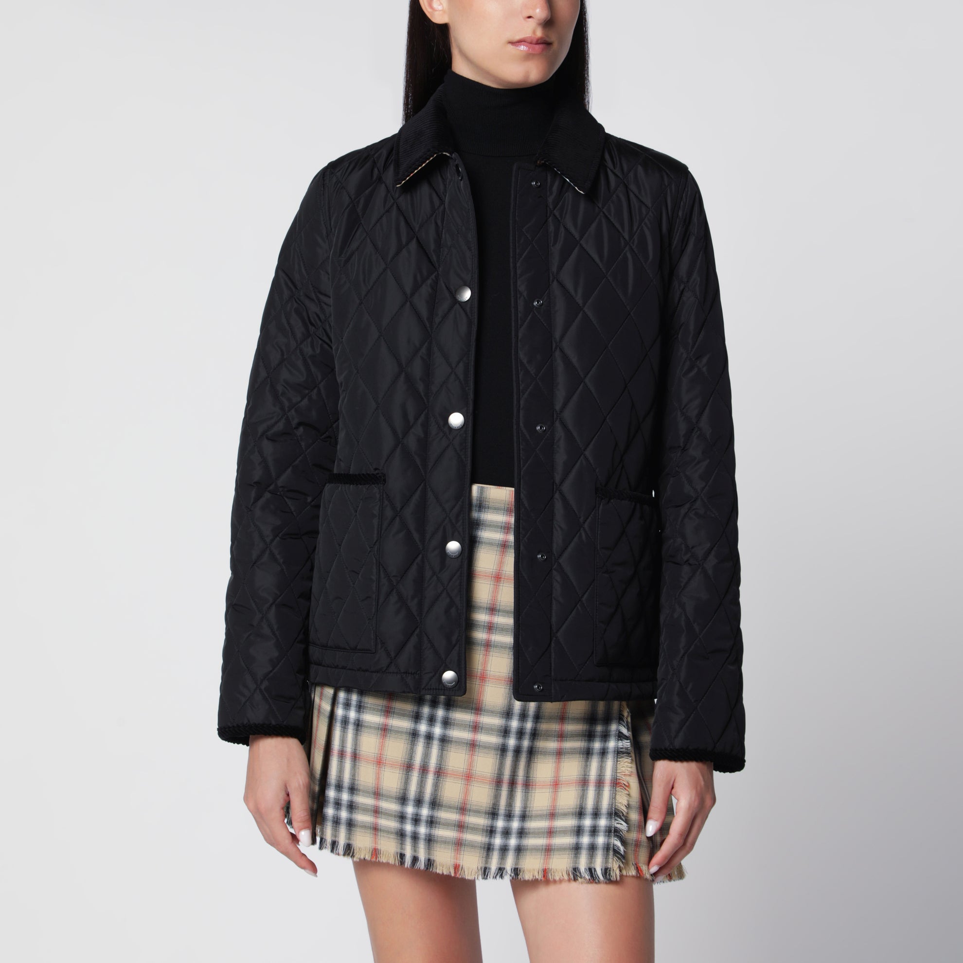 Schwarze gesteppte Jacke aus Nylon