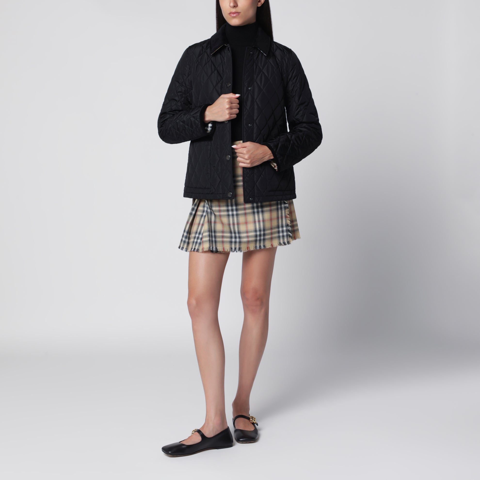 Schwarze gesteppte Jacke aus Nylon