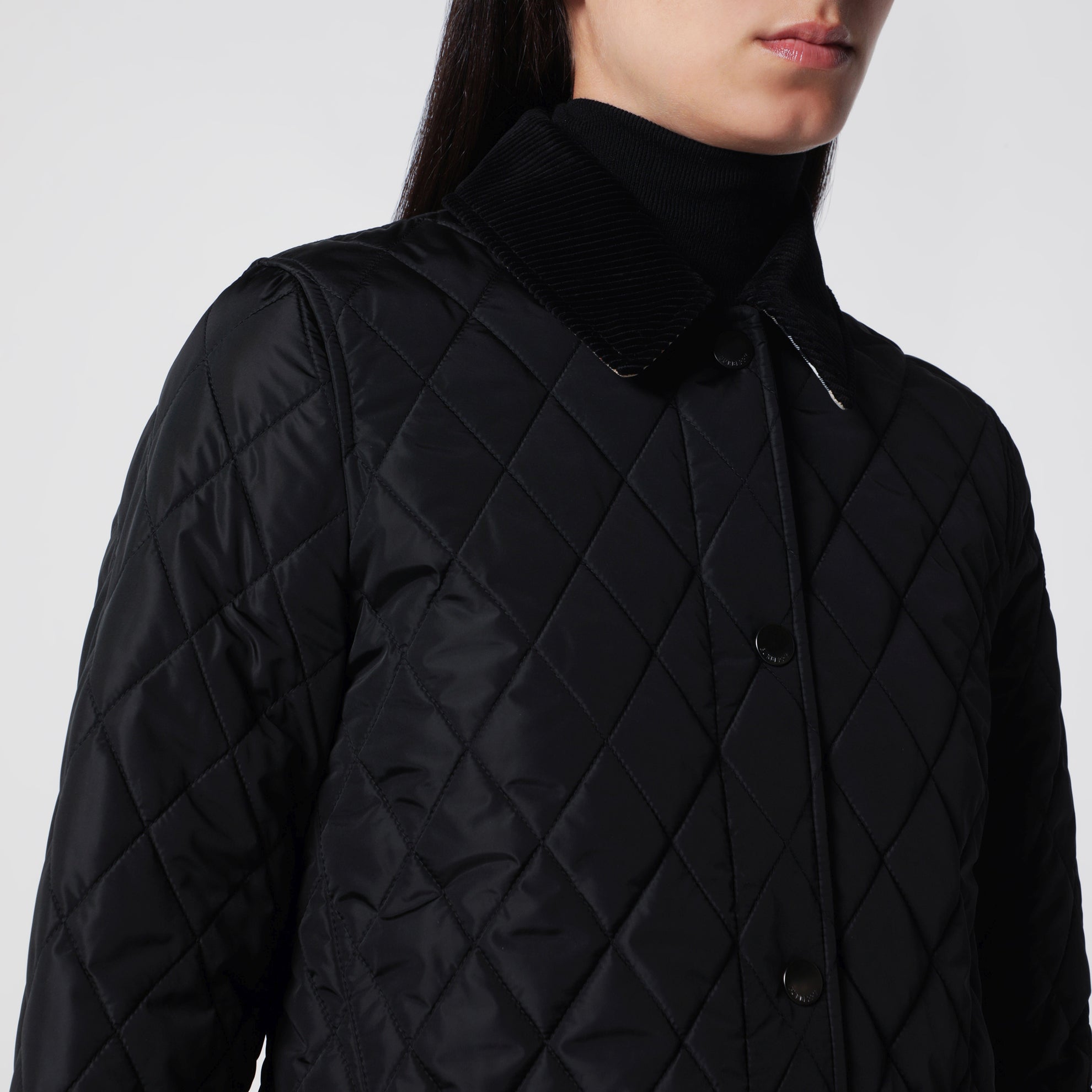Schwarze gesteppte Jacke aus Nylon