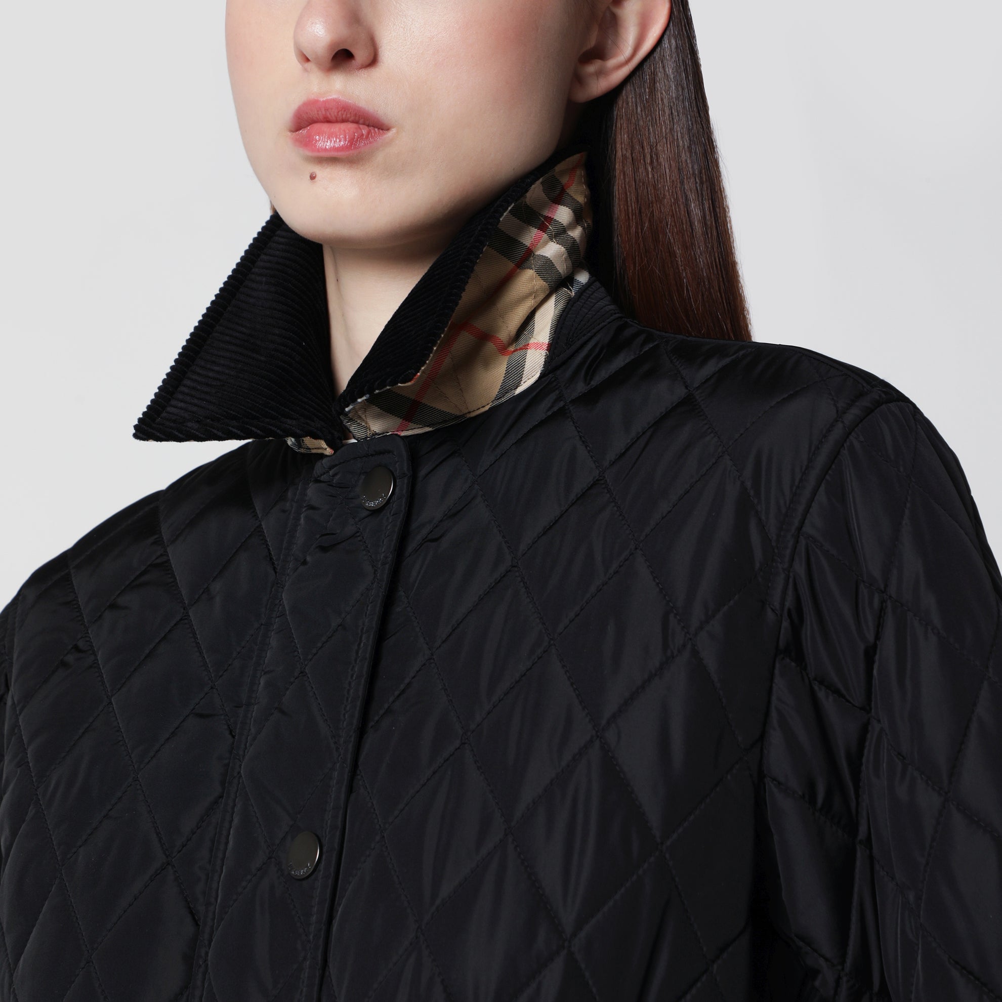 Black quilted nylon jacket