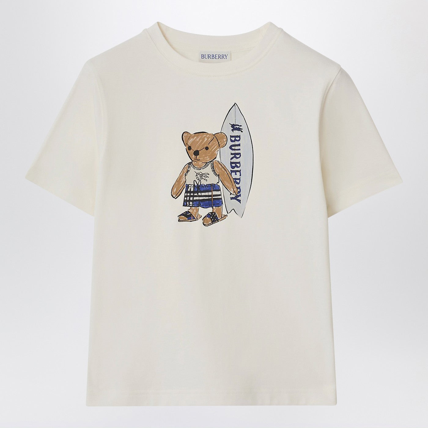 T-shirt bianca con orsetto surfista