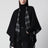 Reversible wool check cape with fringes in black