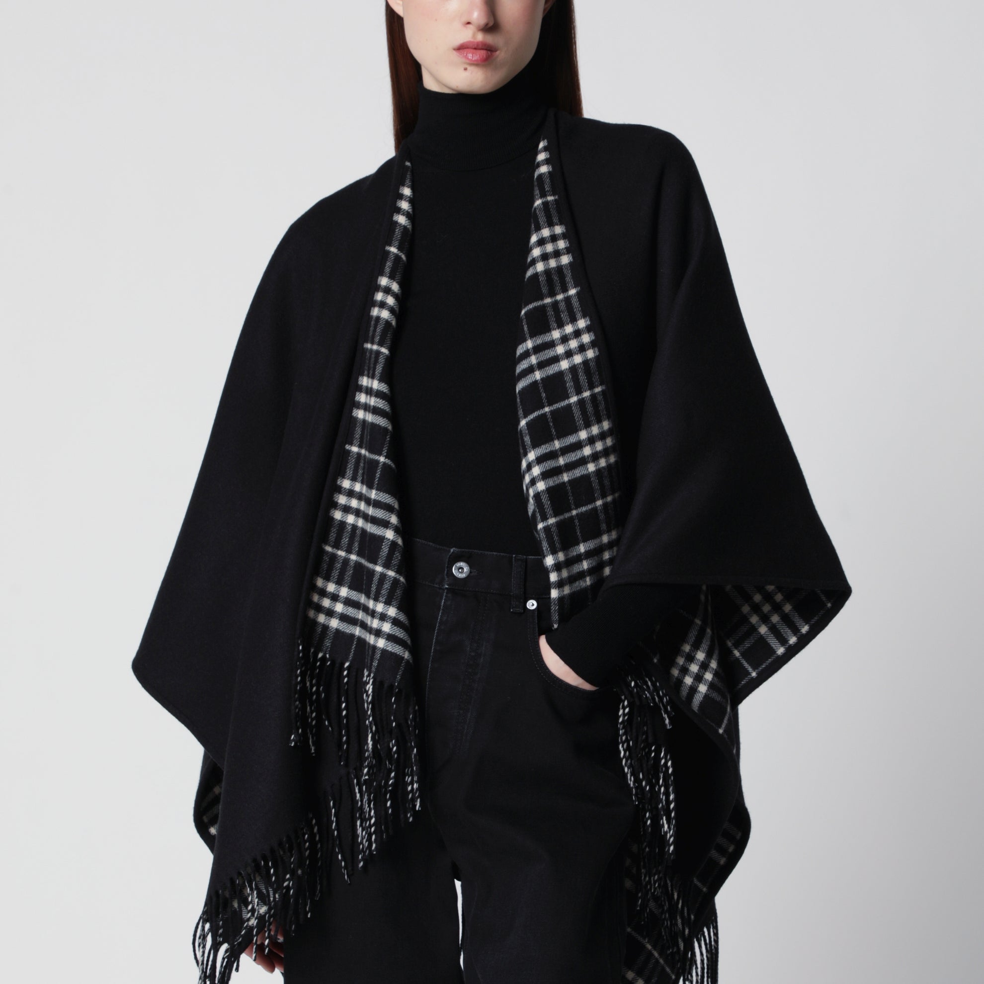 Reversible wool check cape with fringes in black