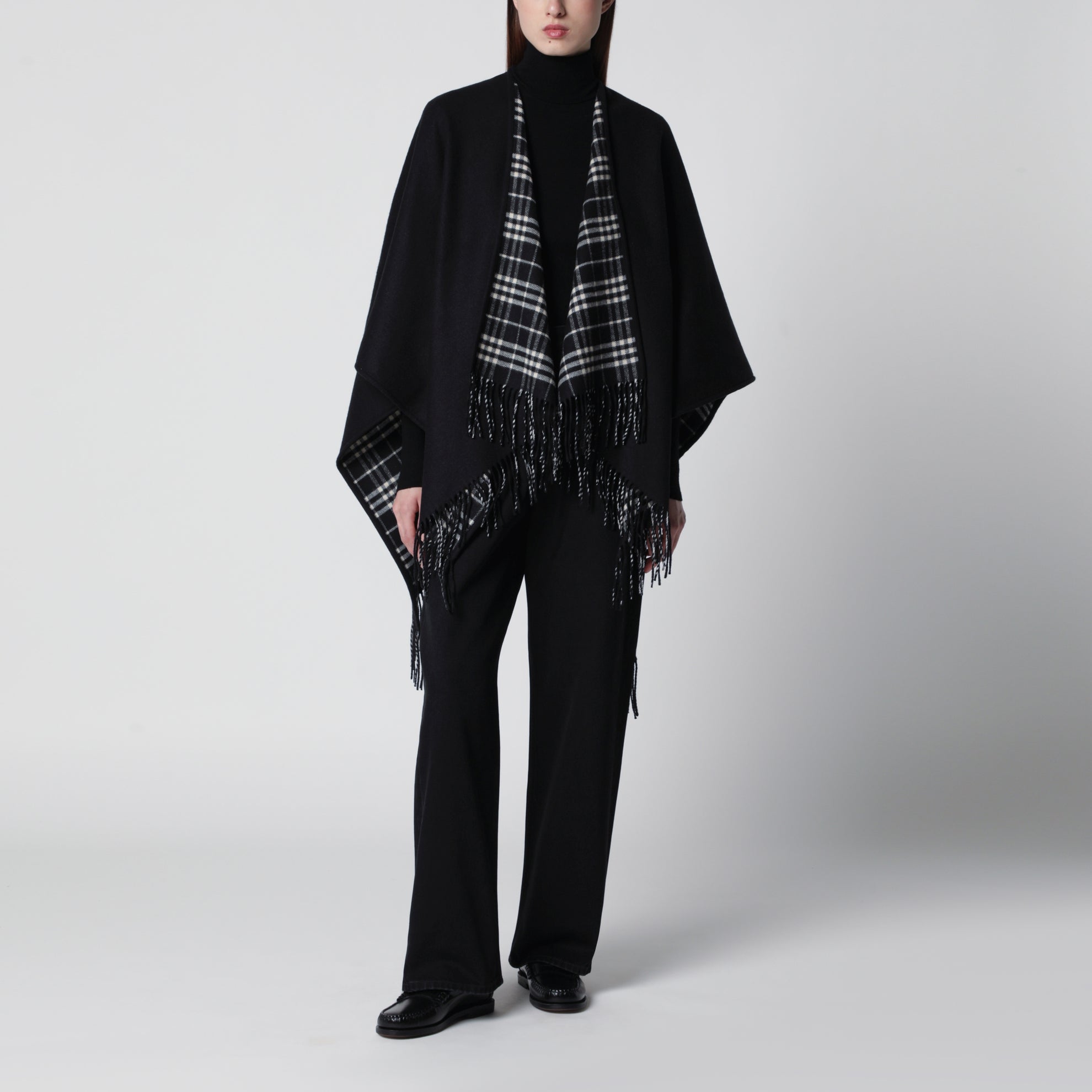 Reversible wool check cape with fringes in black