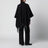 Reversible wool check cape with fringes in black