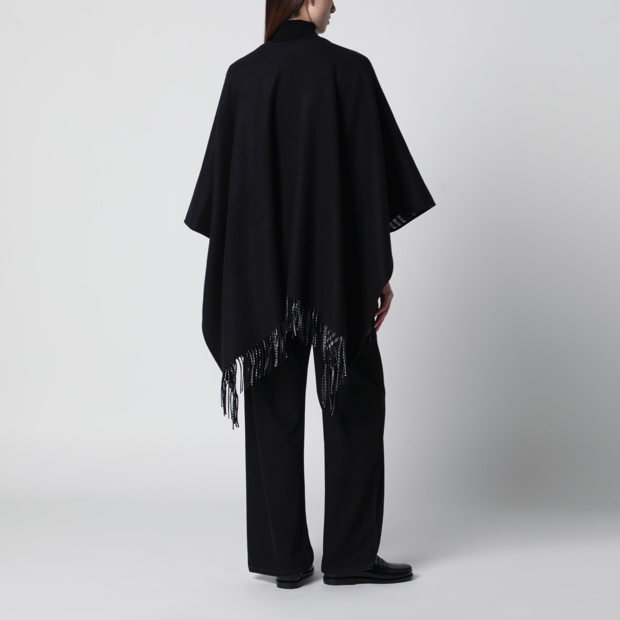 Reversible wool check cape with fringes in black