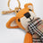 Orange fox charm in knitted cotton