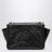 Niki Tripouch black leather shoulder bag