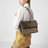 Borsa Niki Tripouch Light Musk in suede