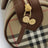 Mini borsa a cilindro Check in Archive Beige