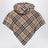 Sand-coloured wool cape with a checked pattern