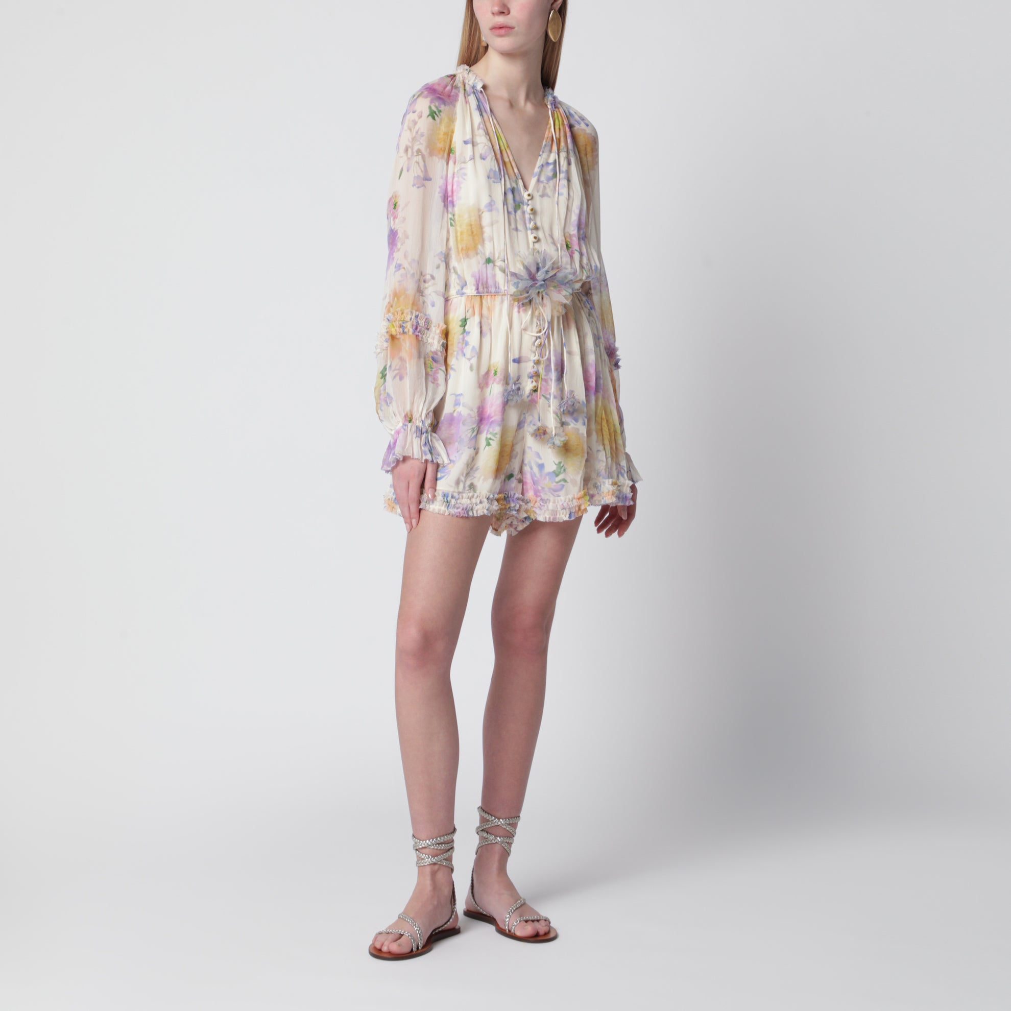 Cream short jumpsuit with floral pattern
