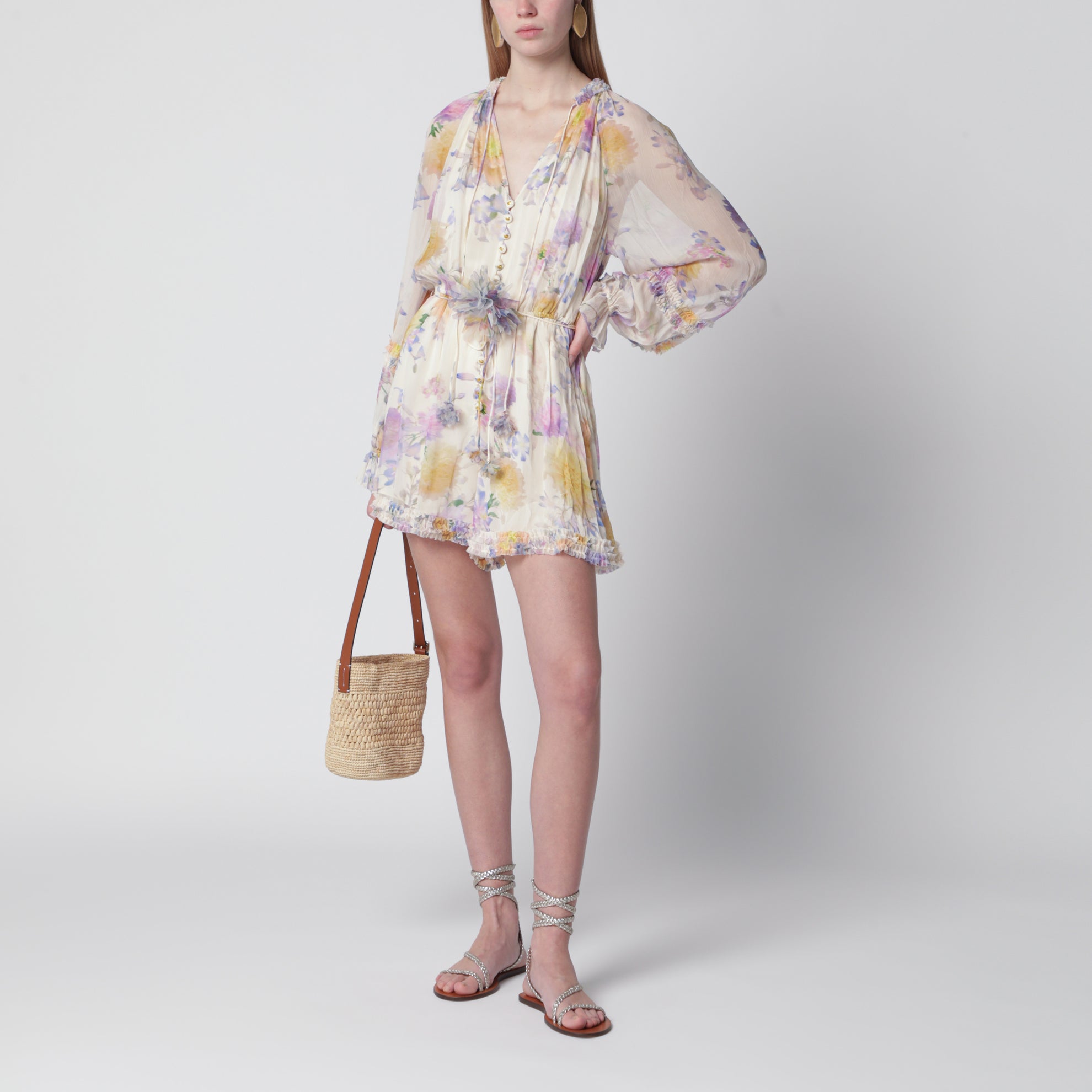 Cream short jumpsuit with floral pattern