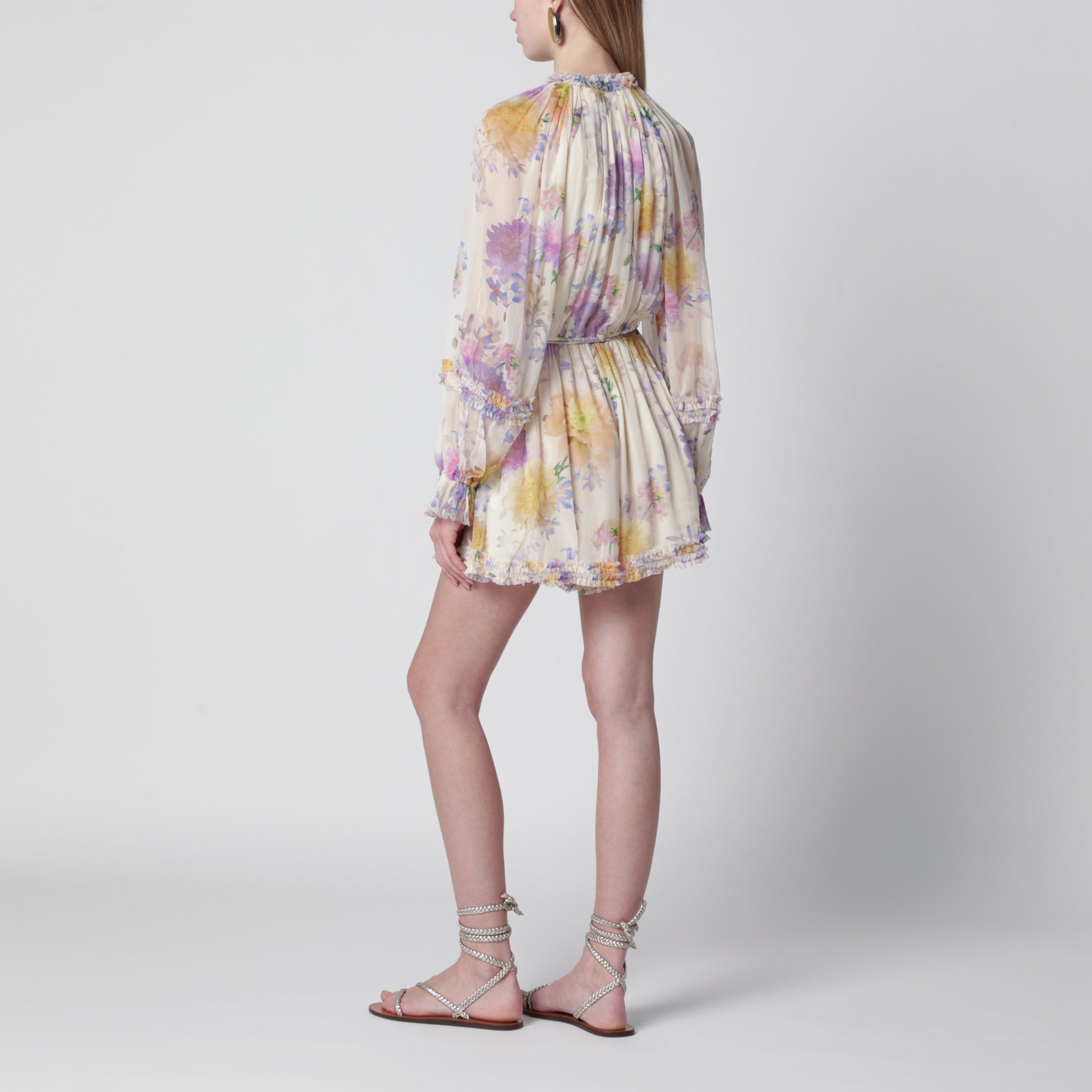 Cream short jumpsuit with floral pattern