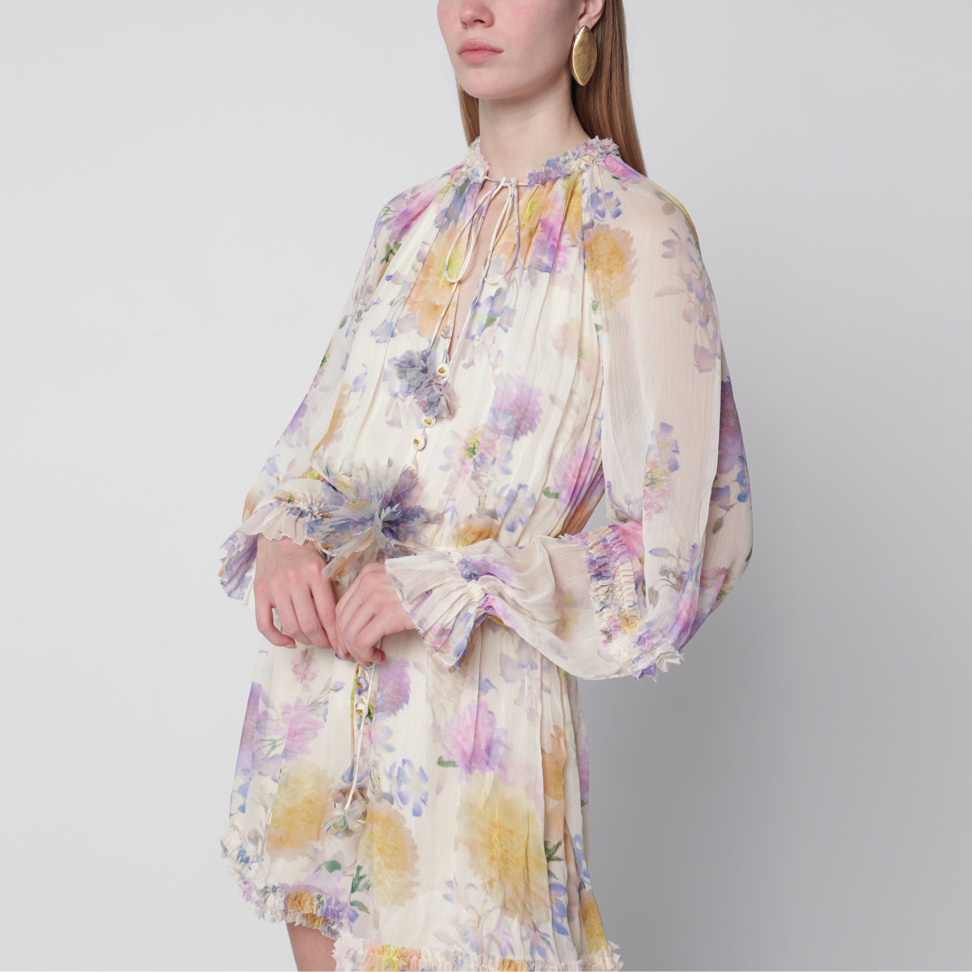 Cream short jumpsuit with floral pattern