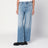Wide light blue jeans with faded effect