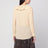 Beige ruffled blouse in silk
