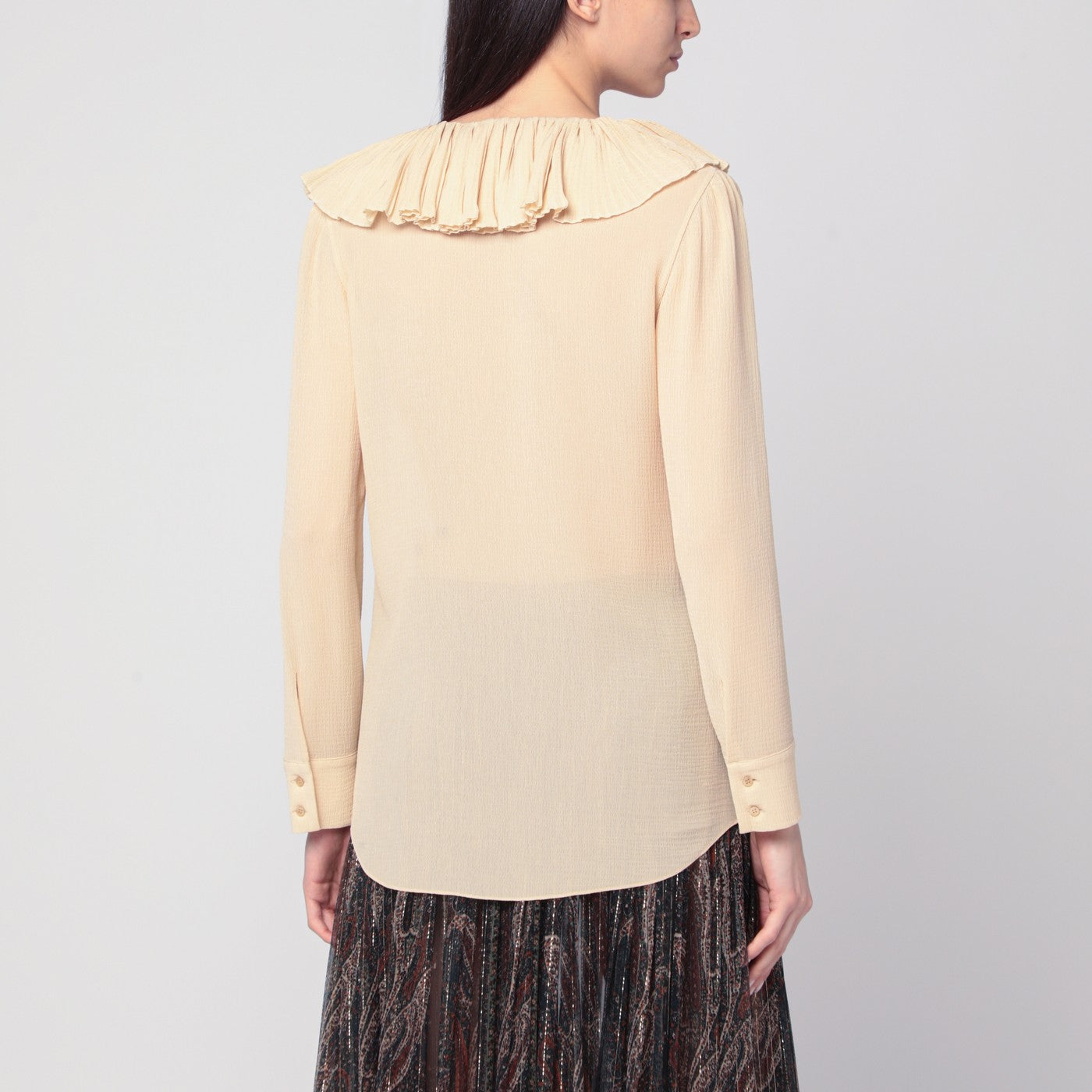 Beige ruffled blouse in silk