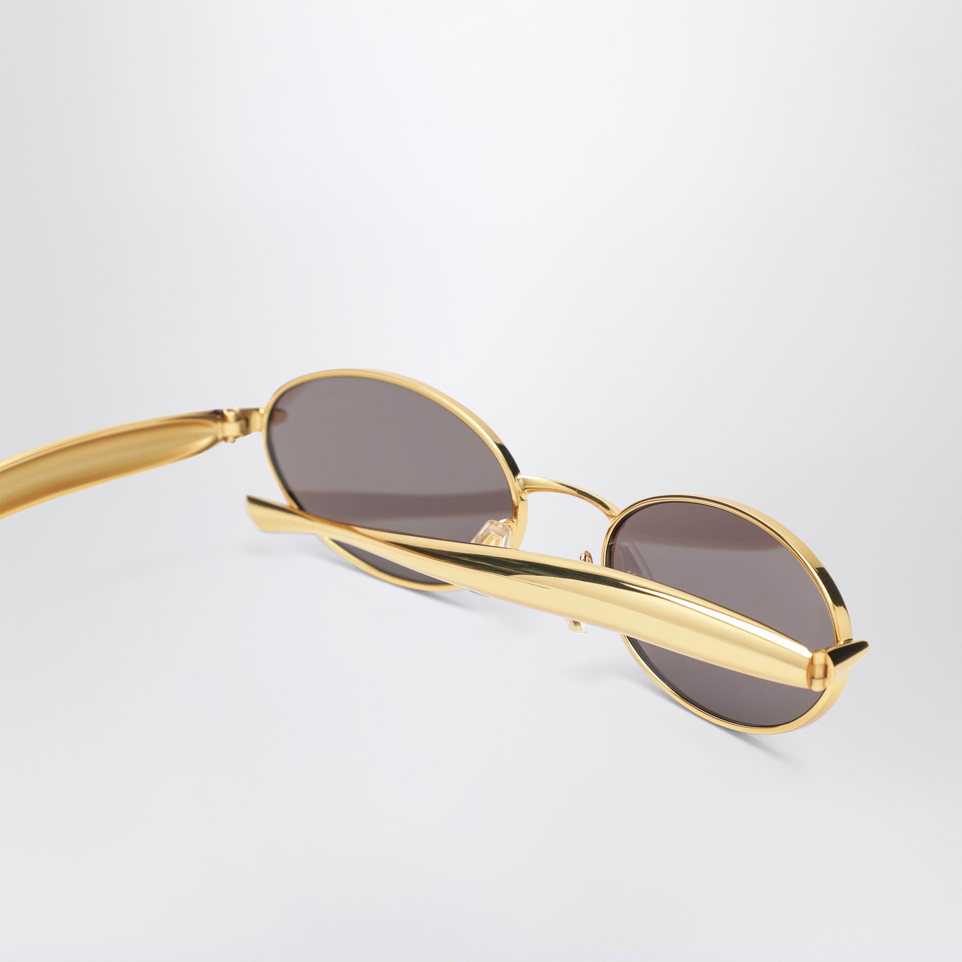 Ovale Sardine-Sonnenbrille aus Metall in Gold/Grau
