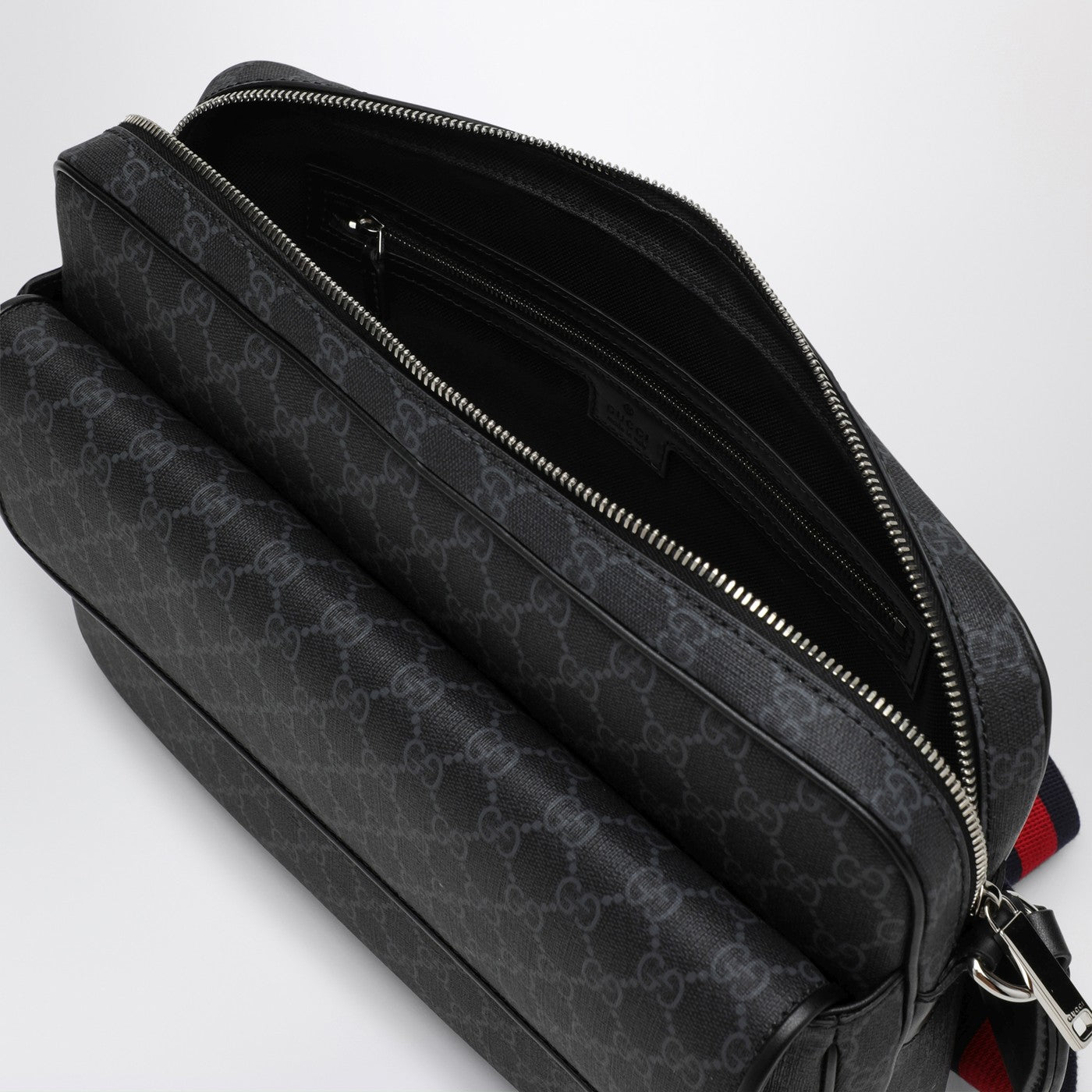 Schwarze Umhängetasche aus GG-Supreme-Stoff