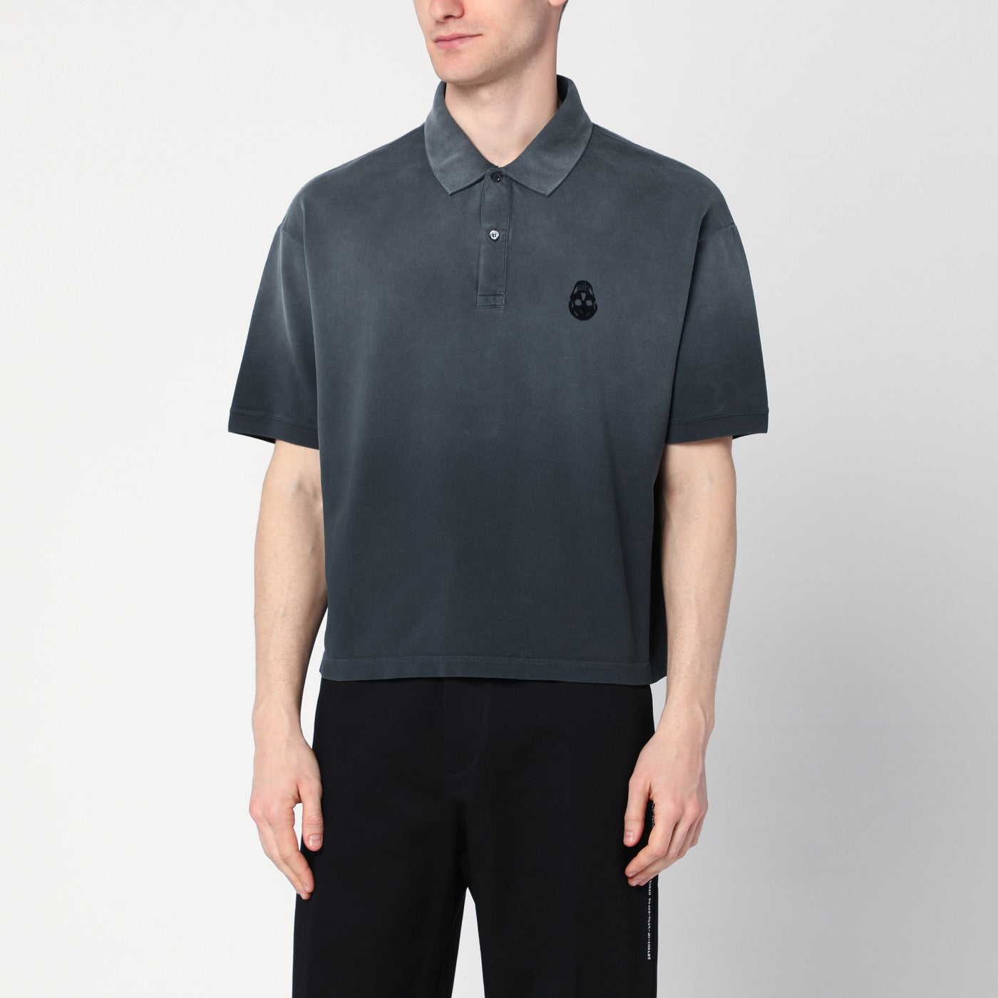 Polo nera effetto slavato in cotone