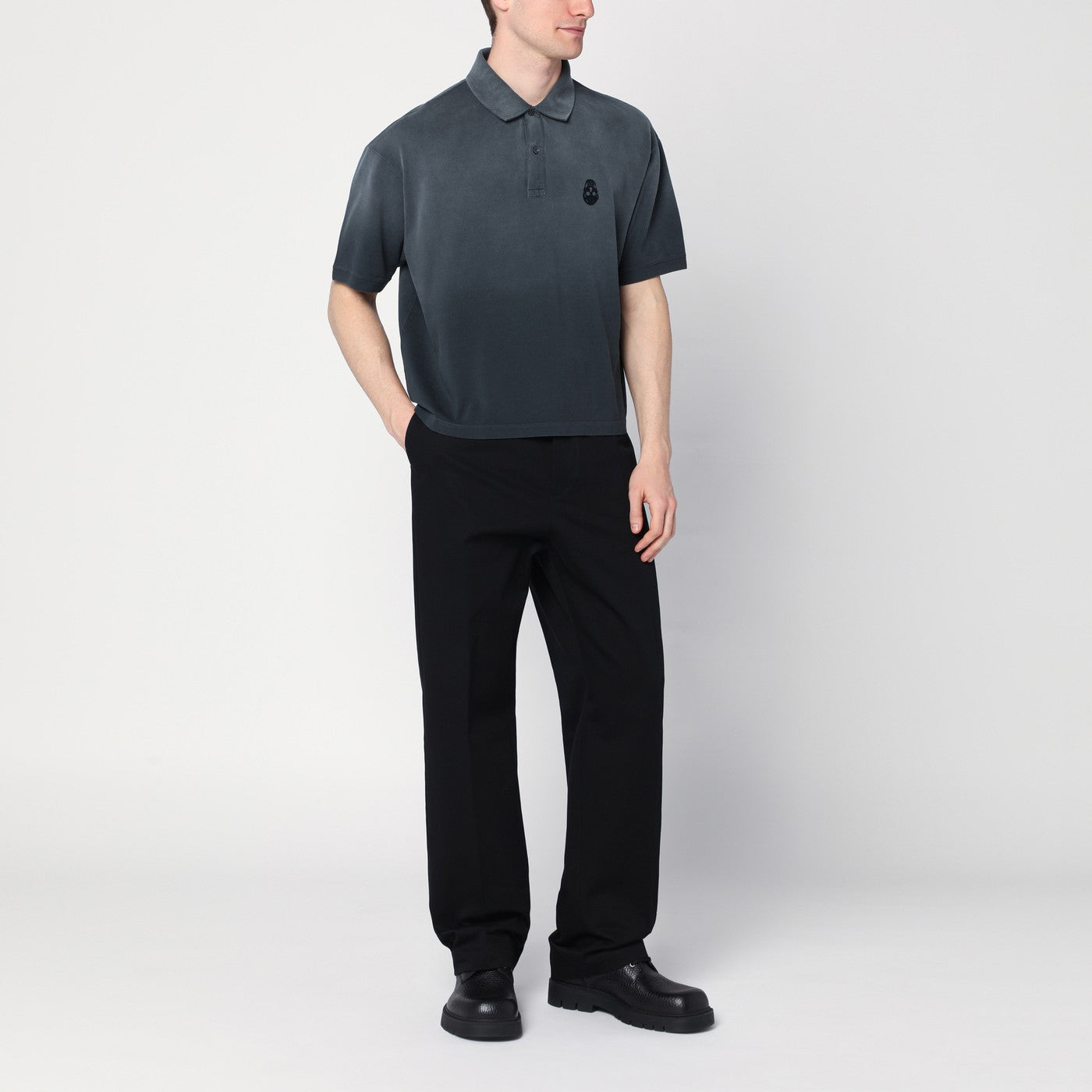 Polo nera effetto slavato in cotone