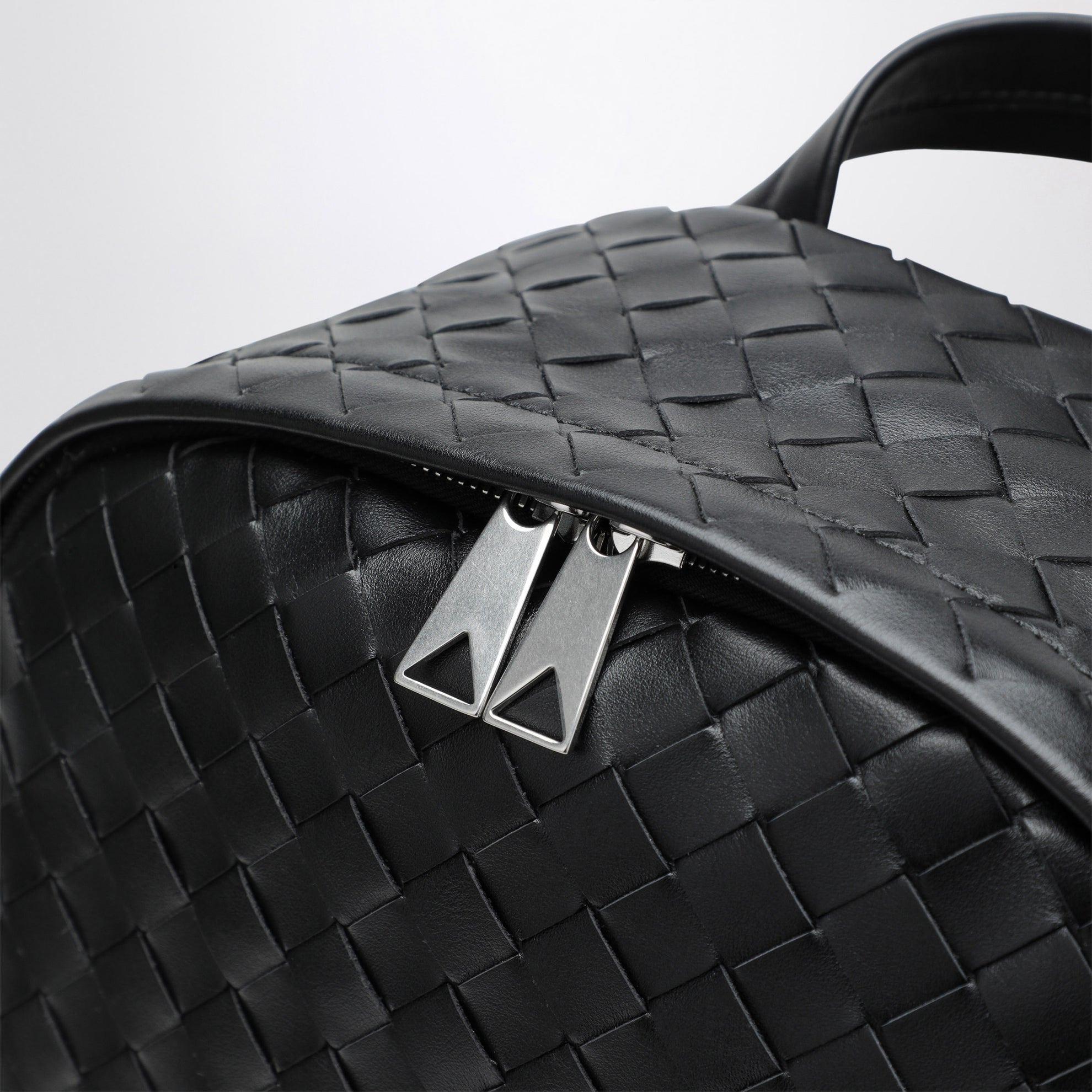 Medium black backpack in Intrecciato weave