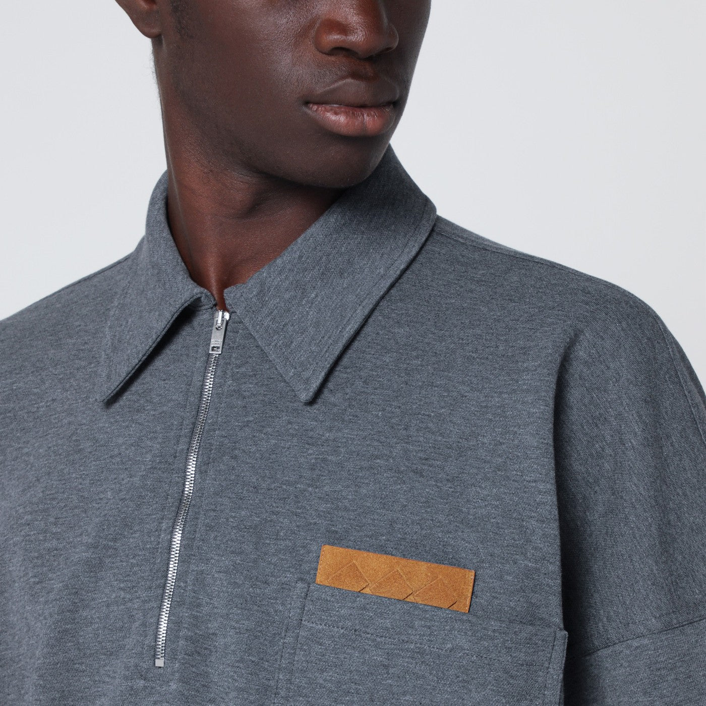 Dark grey polo shirt with Intrecciato detail