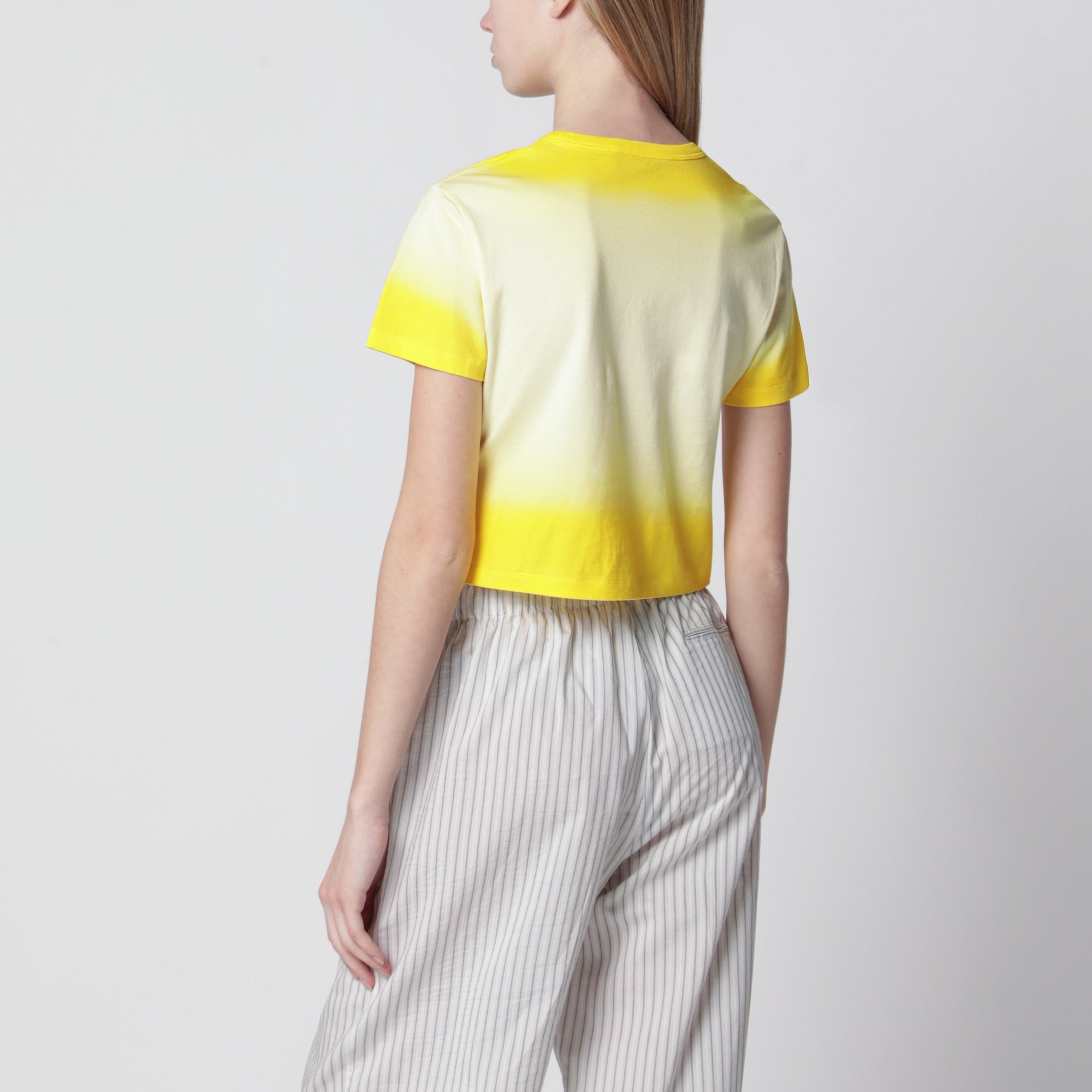 T-shirt cropped gialla effetto sfumato
