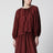 Blusa arricciata Aster in Merlot