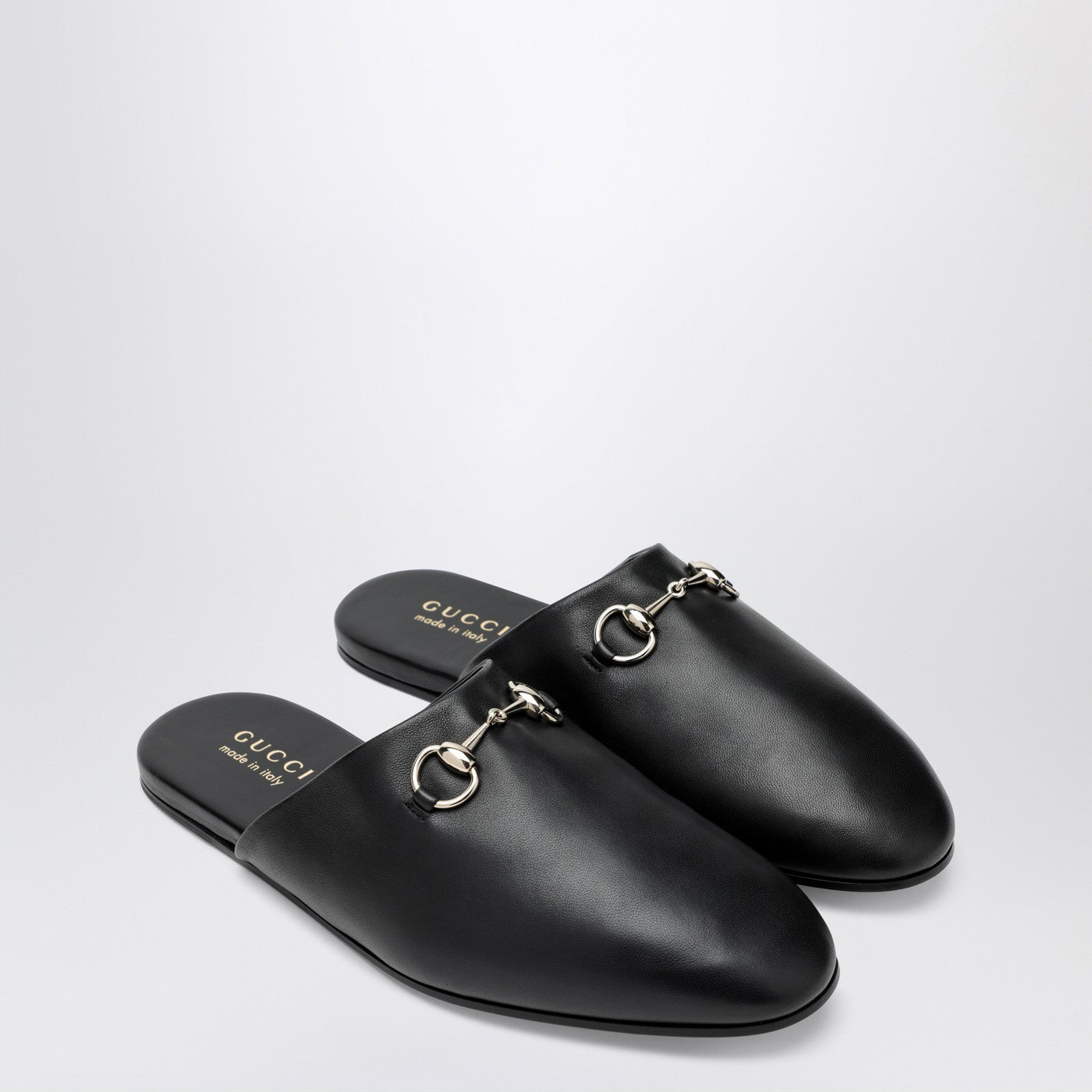 Black leather mules with Horsebit