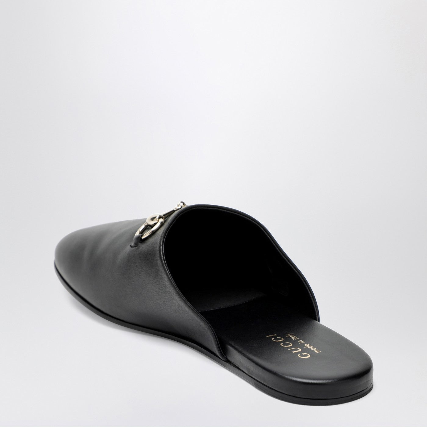 Black leather mules with Horsebit