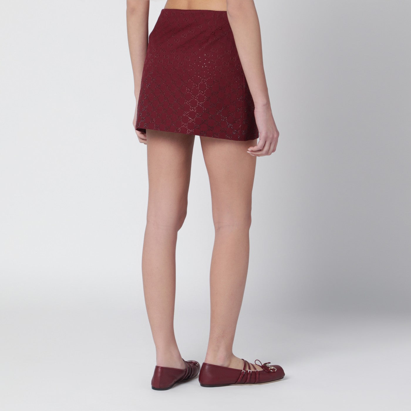 Rosso Ancora GG-fabric mini skirt with crystals