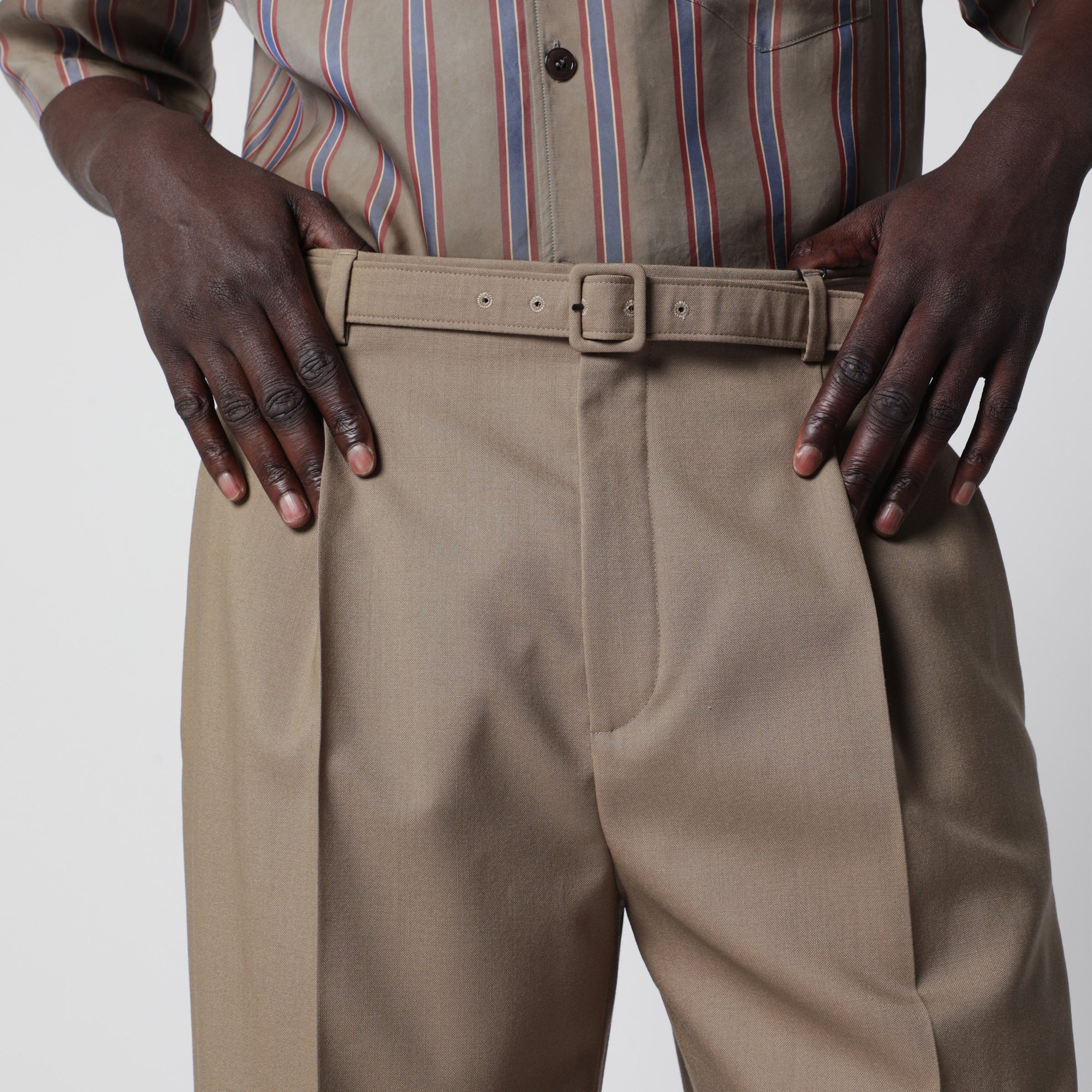 High-waisted tailored trousers with belt in beige wool