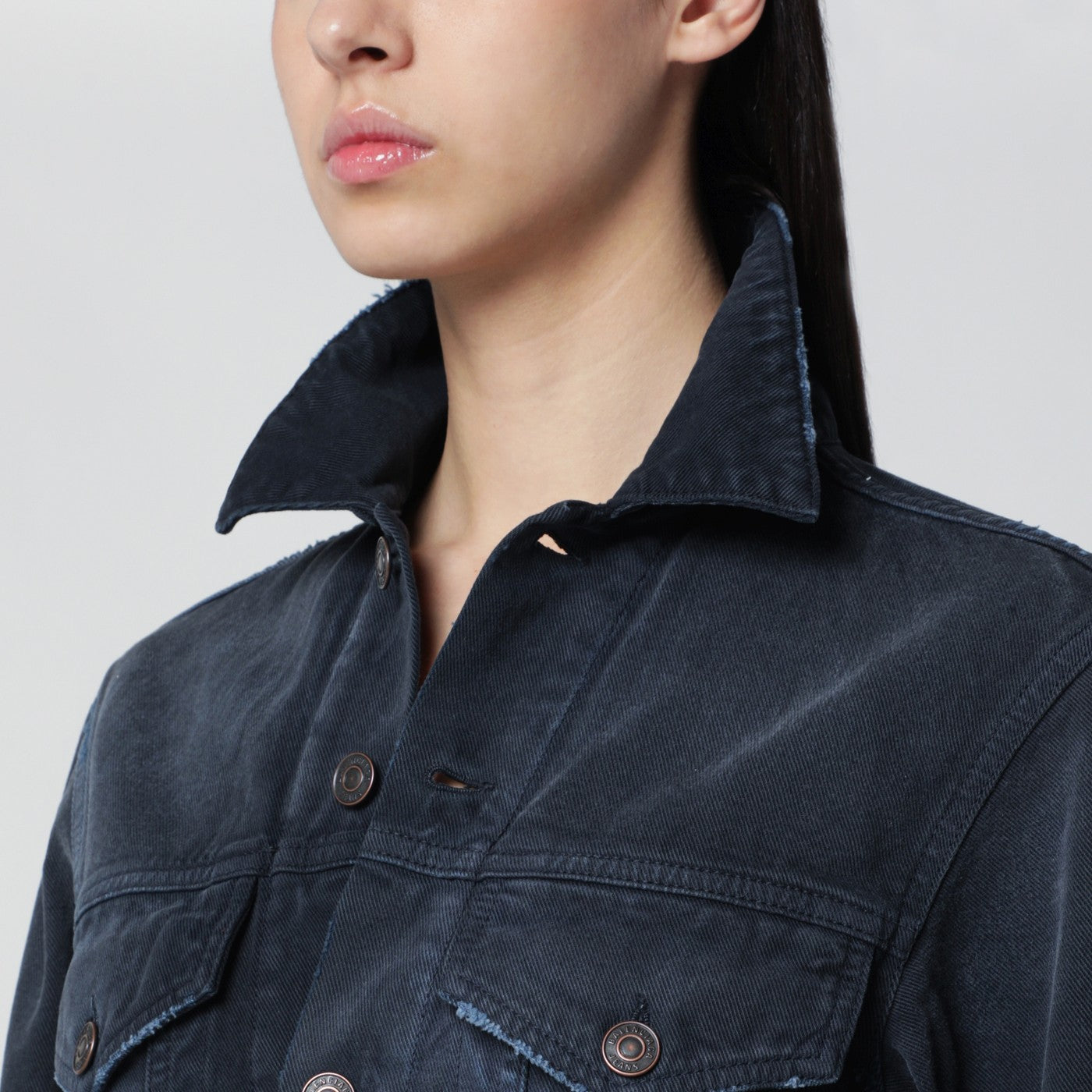 Navy blue jacket with curved waist