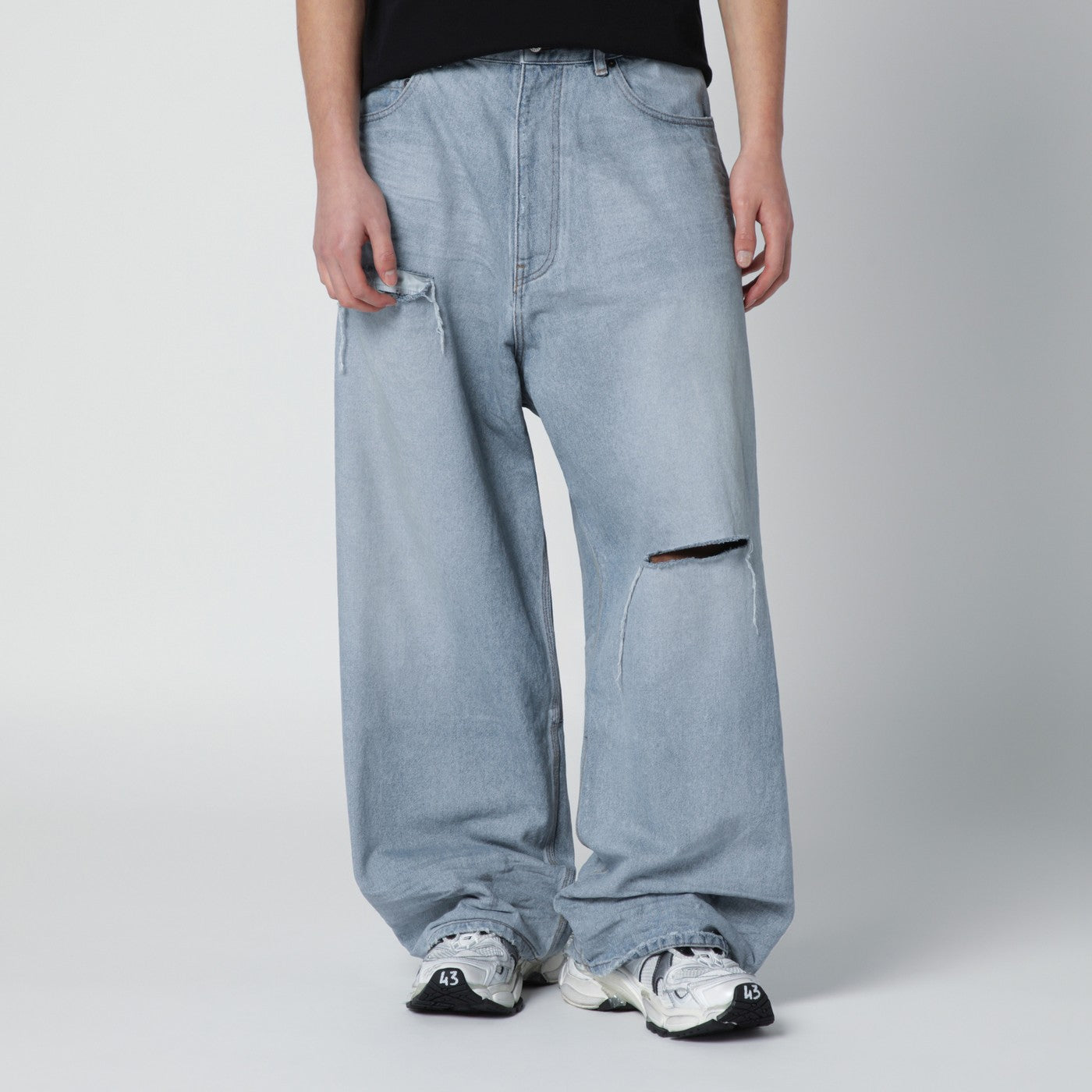 Light blue baggy jeans with rips