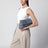 Giorno woven suede clutch in cloudy indigo